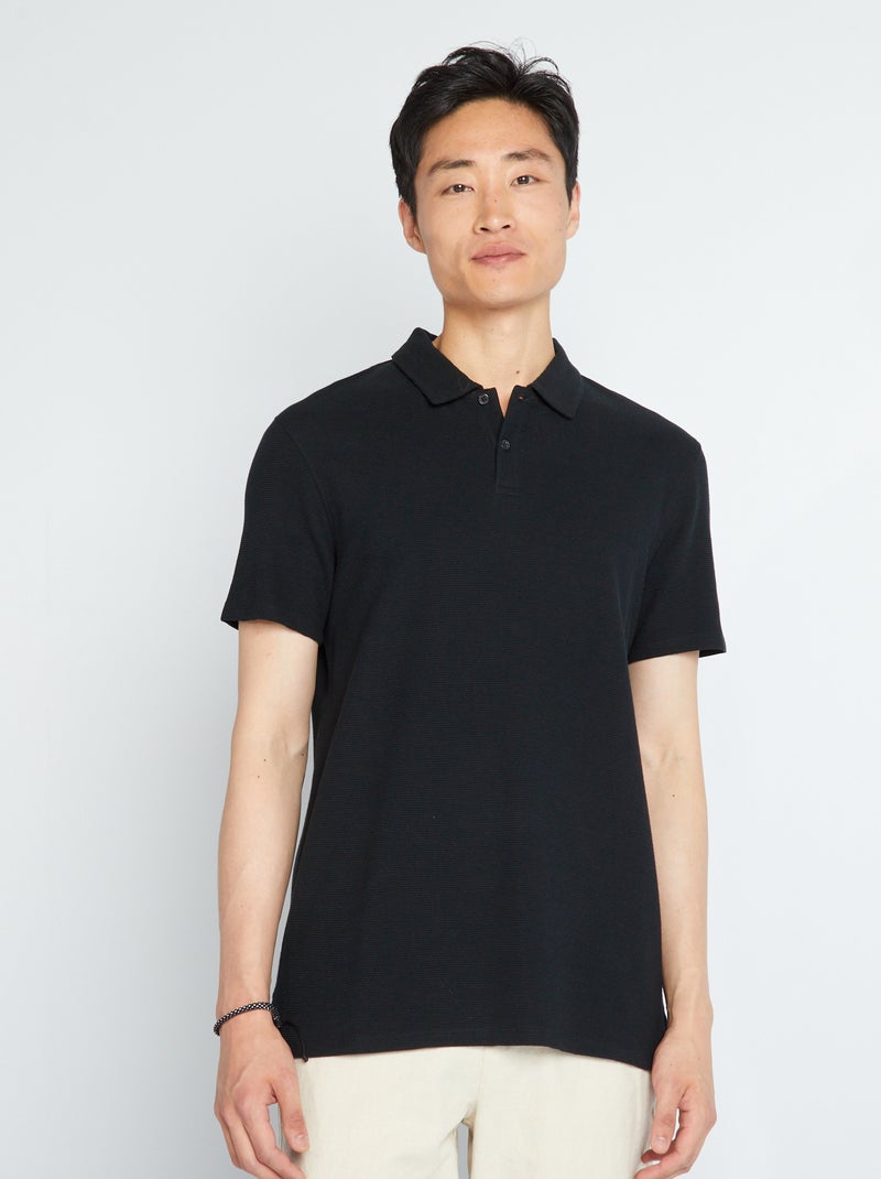 Polo en jacquard uni noir - Kiabi