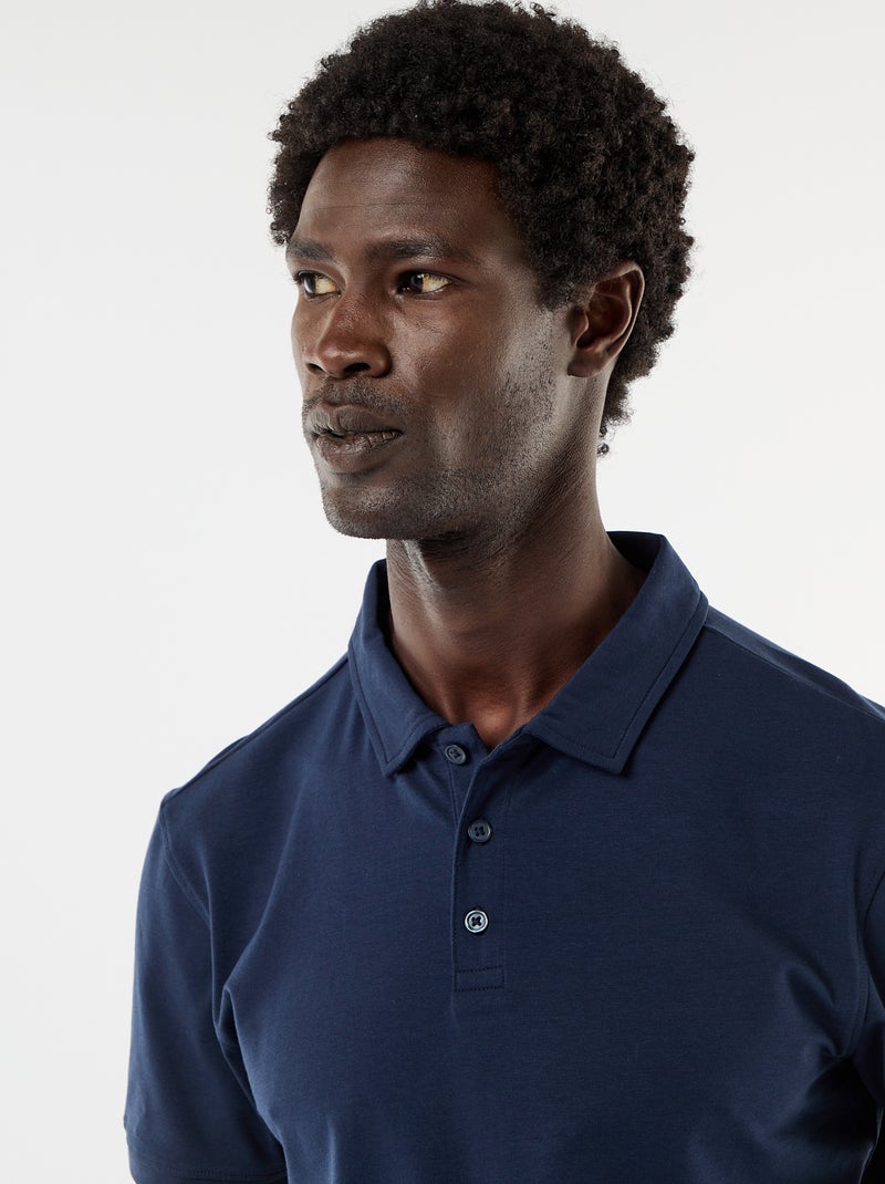 Polo en jersey avec col boutonné Noir - Kiabi