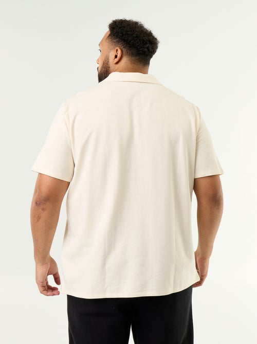 Polo en maille jersey manches courtes - Kiabi Polo en maille jersey manches courtes - Kiabi