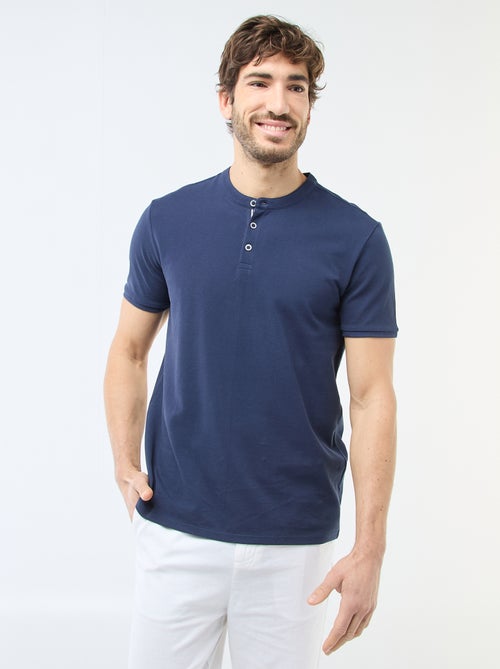 Polo en maille piquée homme à col tunisien uni - Kiabi Polo en maille piquée homme à col tunisien uni - Kiabi