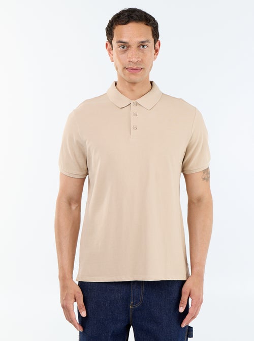 Polo en maille piquée uni Homme à manches courtes - Kiabi Polo en maille piquée uni Homme à manches courtes - Kiabi
