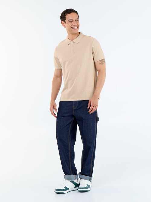 Polo en maille piquée uni Homme à manches courtes - Kiabi Polo en maille piquée uni Homme à manches courtes - Kiabi