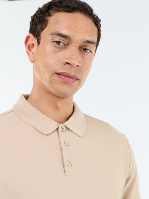 Polo en maille piquée uni Homme à manches courtes - Kiabi Polo en maille piquée uni Homme à manches courtes - Kiabi