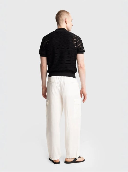 Polo en maille texturée avec fermeture boutonnée giesto - Kiabi Polo en maille texturée avec fermeture boutonnée giesto - Kiabi