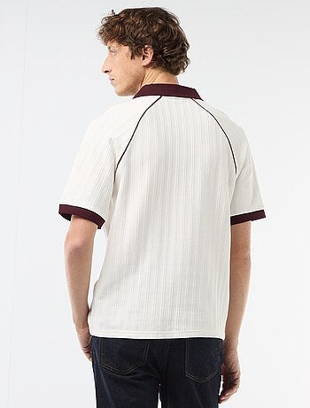 Polo en matière fantaisie col polo sans boutons