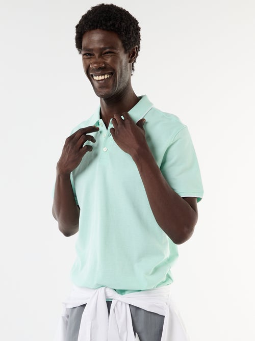 Polo homme en coton avec broderie tropicale - Kiabi Polo homme en coton avec broderie tropicale - Kiabi
