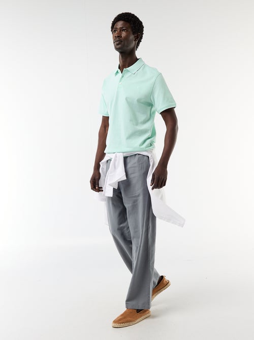 Polo homme en coton avec broderie tropicale - Kiabi Polo homme en coton avec broderie tropicale - Kiabi