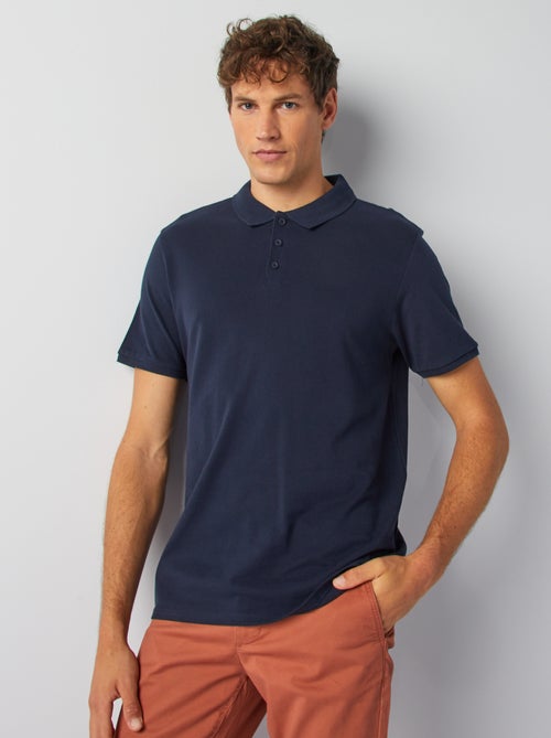 Polo homme en coton biologique à manches courtes uni - Kiabi Polo homme en coton biologique à manches courtes uni - Kiabi