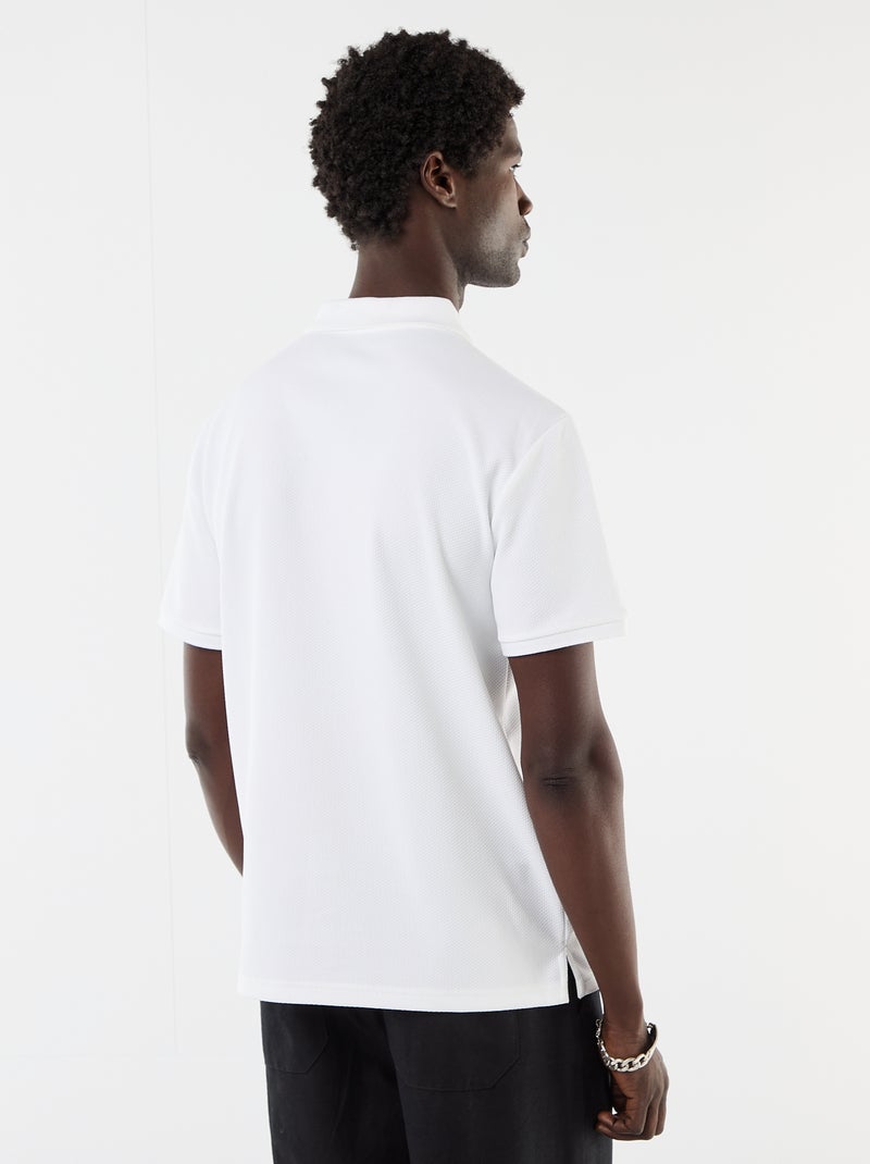 Polo van gewafelde stof met ritskraag Wit - Kiabi