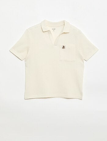 Polo van gewafelde stof