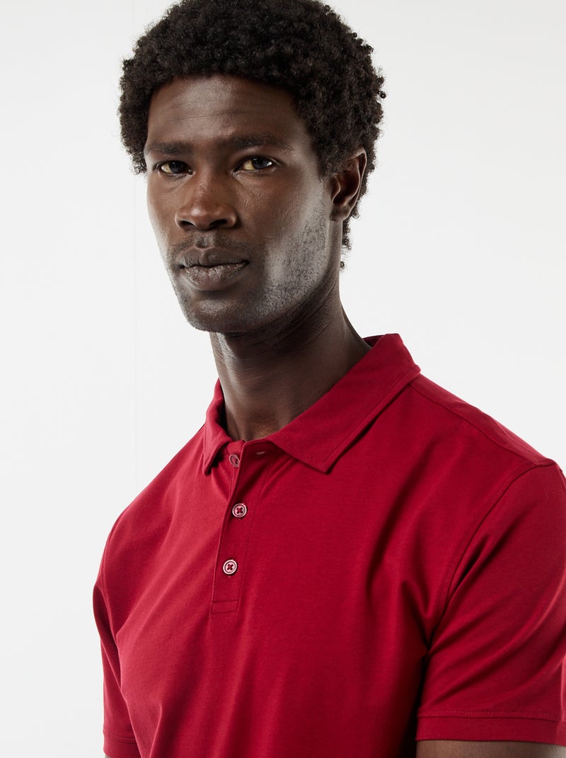 Polo van jerseytricot met knoopsluiting Rood - Kiabi