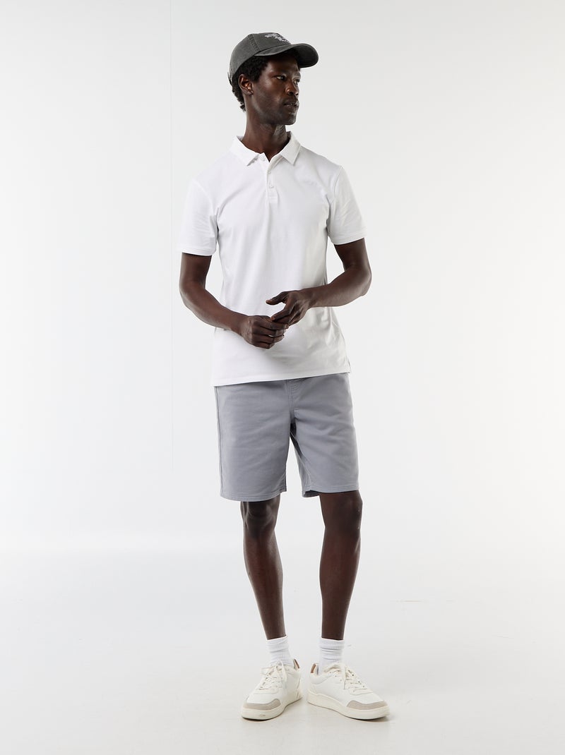 Polo van jerseytricot met knoopsluiting Wit - Kiabi