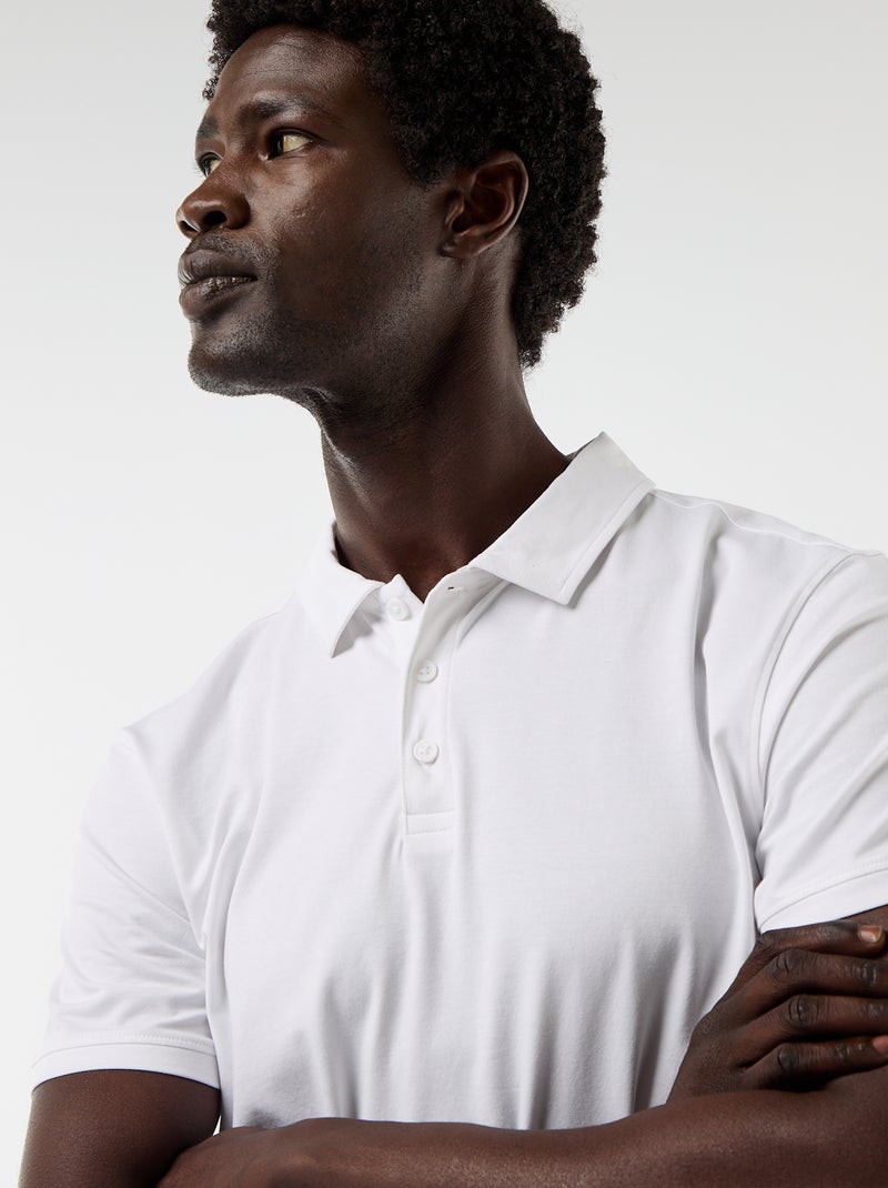 Polo van jerseytricot met knoopsluiting Wit - Kiabi