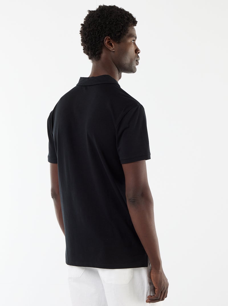 Polo van jerseytricot met knoopsluiting Zwart - Kiabi