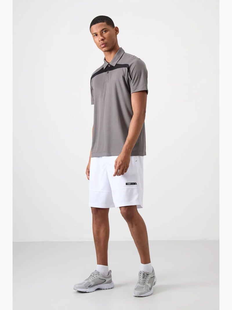 Poloshirt met kleurvlakken tommy Grijs - Kiabi