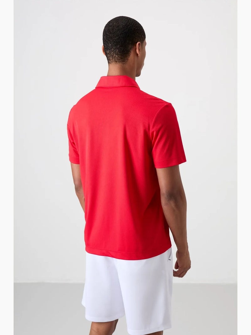 Poloshirt met knopen tommy Rood - Kiabi
