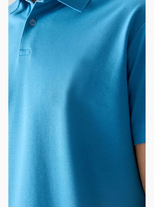 Poloshirt ruimvallend tommy - Kiabi Poloshirt ruimvallend tommy - Kiabi