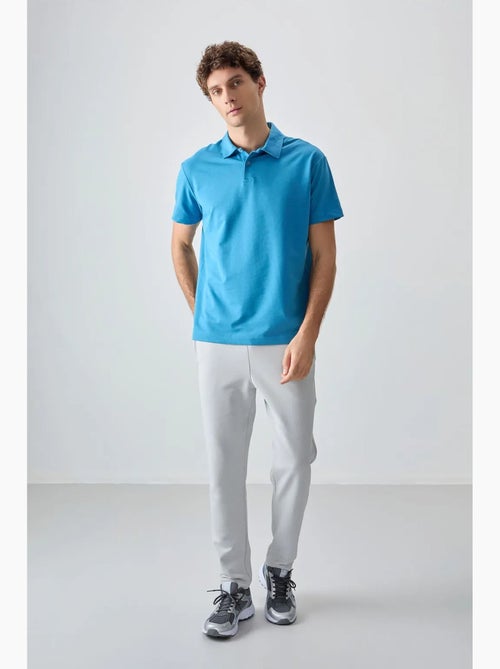 Poloshirt ruimvallend tommy - Kiabi Poloshirt ruimvallend tommy - Kiabi