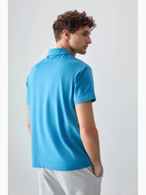 Poloshirt ruimvallend tommy - Kiabi Poloshirt ruimvallend tommy - Kiabi