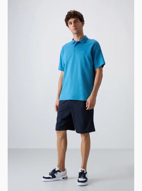Poloshirt ruimvallend tommy - Kiabi
