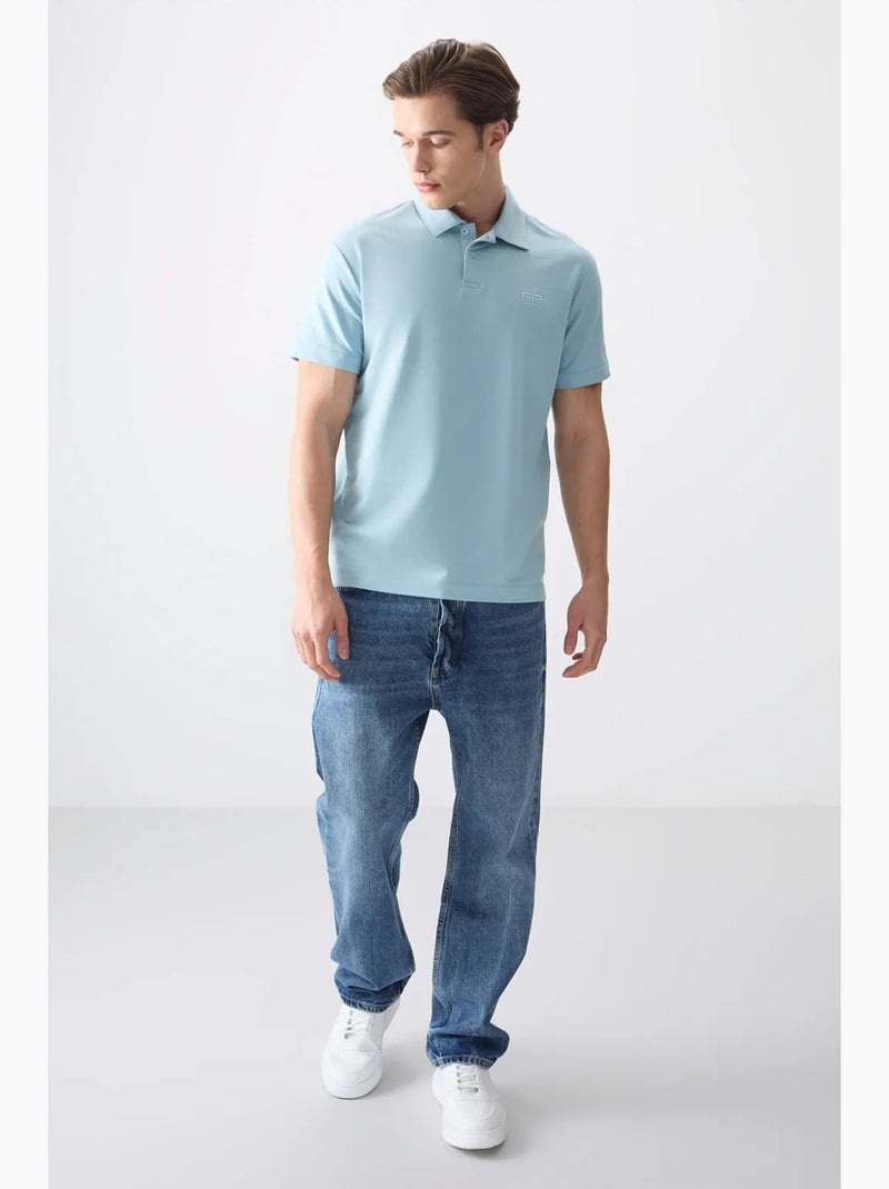 Poloshirt ruimvallend tommy Hemelsblauw - Kiabi