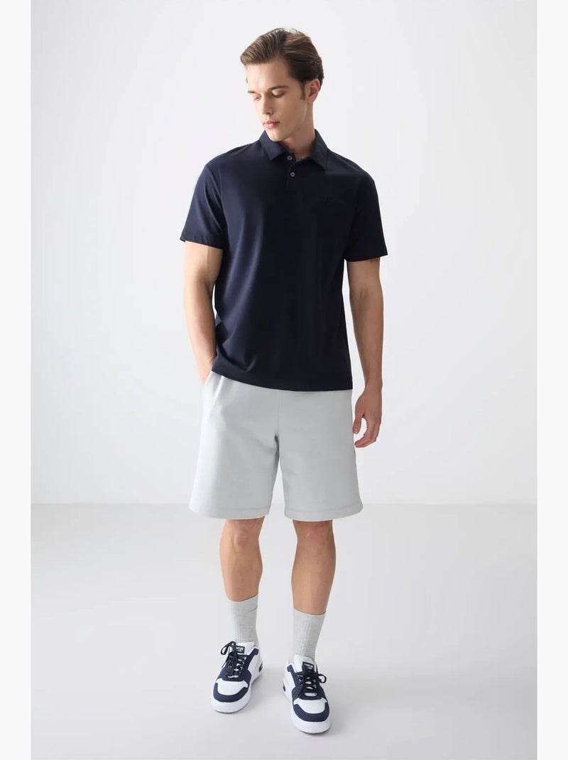Poloshirt ruimvallend tommy Marineblauw - Kiabi