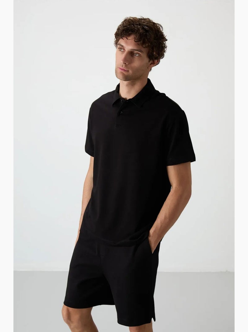 Poloshirt ruimvallend tommy Zwart - Kiabi
