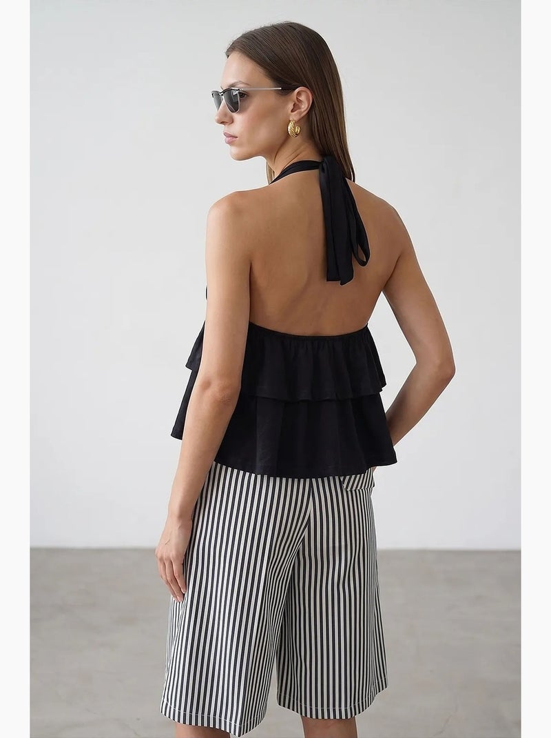 Poplin blouse met halternek en volant dilvin Zwart - Kiabi