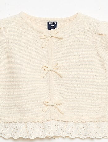 Pull à manches courtes avec nœuds fantaisies