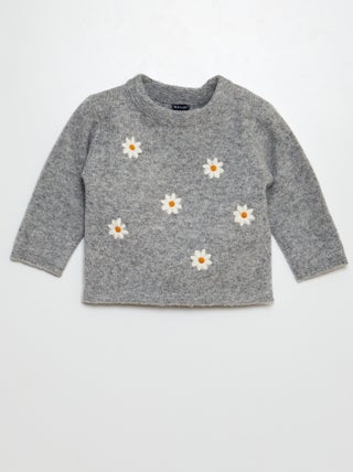 Pull avec broderies en forme de fleurs