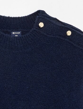Pull avec ouverture épaule aimantée