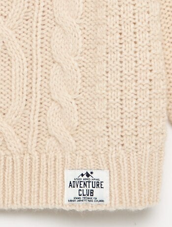Pull avec torsades