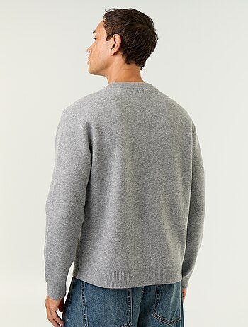 Pull col rond avec inscriptions