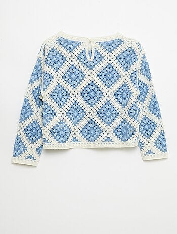 Pull en maille ajourée avec broderies fleurs