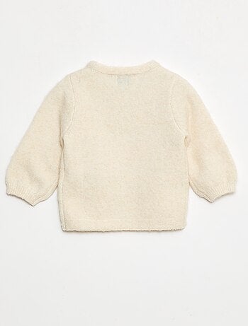 Pull en maille avec nœud fantaisie devant