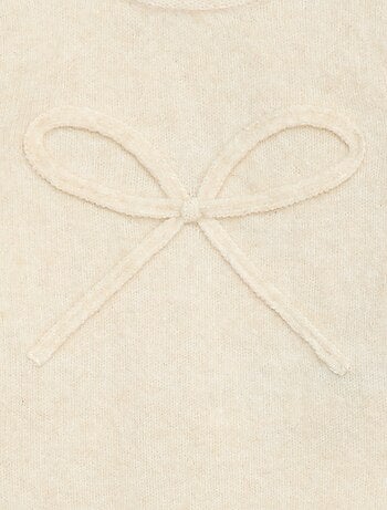 Pull en maille avec nœud fantaisie devant