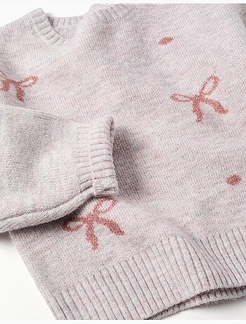 Pull en maille avec nœuds et pois jacquard