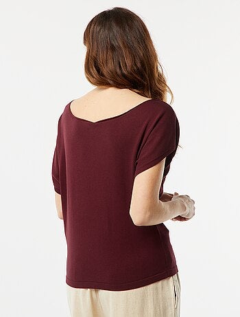 Pull en maille avec un col bateau et des manches courtes