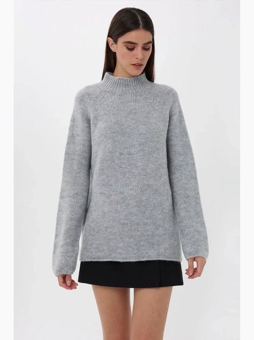 Pull en tricot surdimensionné à col montant hiccup - Kiabi Pull en tricot surdimensionné à col montant hiccup - Kiabi