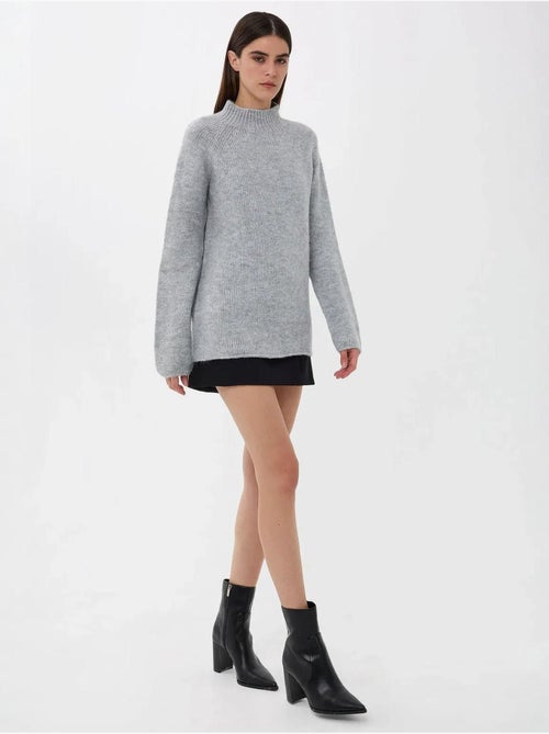 Pull en tricot surdimensionné à col montant hiccup - Kiabi Pull en tricot surdimensionné à col montant hiccup - Kiabi
