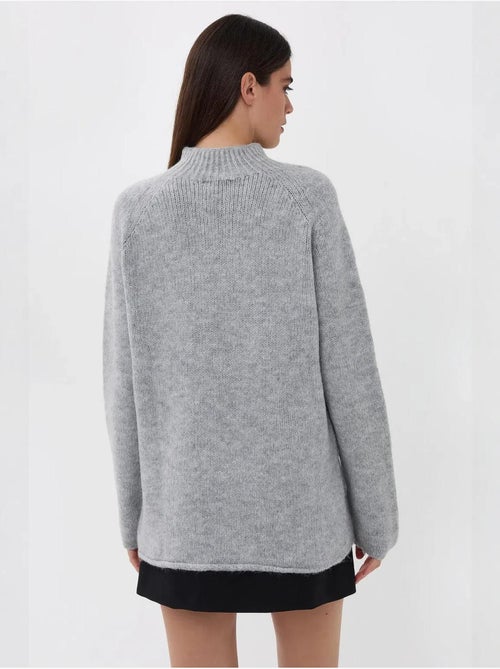 Pull en tricot surdimensionné à col montant hiccup - Kiabi Pull en tricot surdimensionné à col montant hiccup - Kiabi