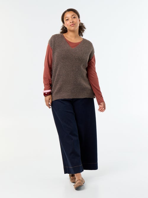 Pull sans manches avec bijoux fantaisies dorés - Kiabi Pull sans manches avec bijoux fantaisies dorés - Kiabi