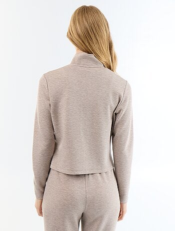 Pull zippé col montant