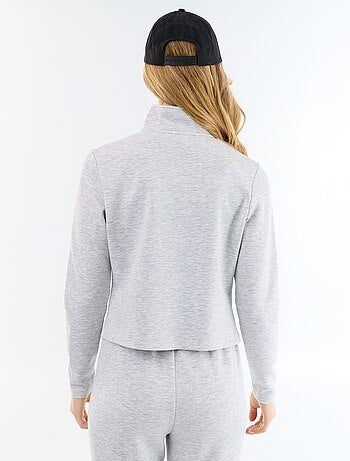 Pull zippé col montant