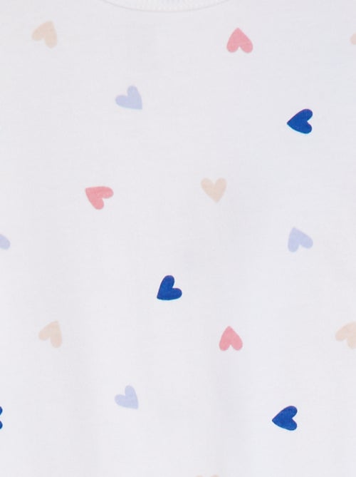 Pyjama met voetjes en motiefje - Kiabi Pyjama met voetjes en motiefje - Kiabi