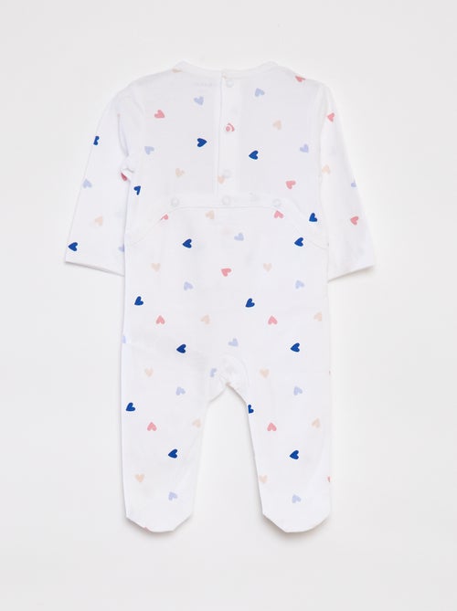 Pyjama met voetjes en motiefje - Kiabi Pyjama met voetjes en motiefje - Kiabi