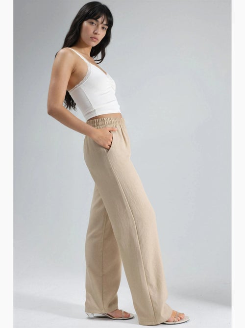 Rechte broek met elastische taille hiccup - Kiabi Rechte broek met elastische taille hiccup - Kiabi