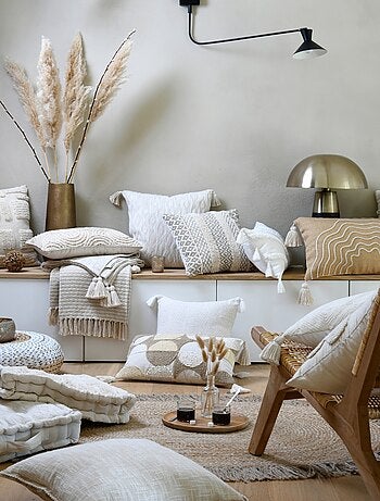 Rechthoekig beige kussen met reliëf