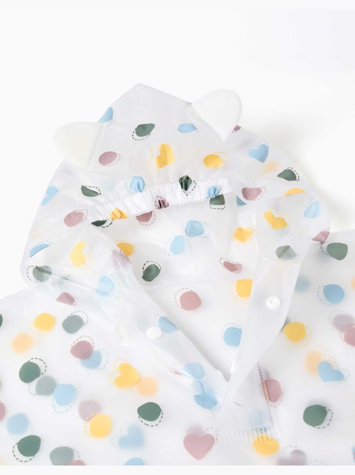 Regenponcho met capuchon met stippenpatroon - Kiabi Regenponcho met capuchon met stippenpatroon - Kiabi