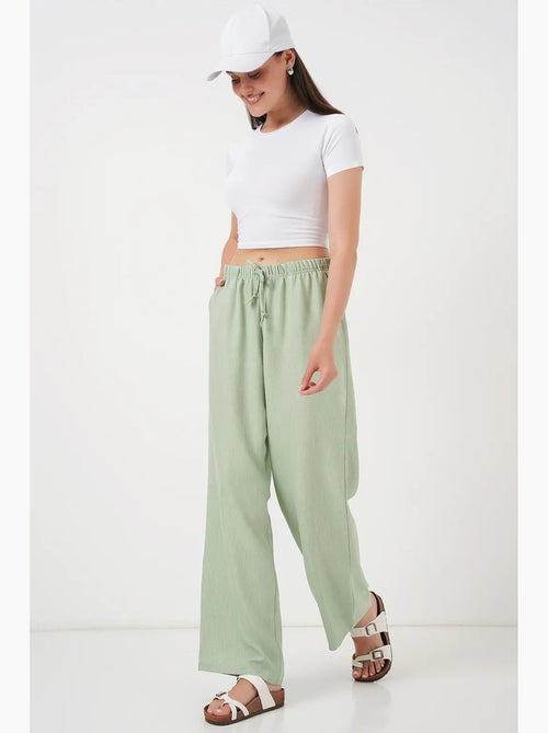 Relaxed broek met wijde pijpen en trekkoord bdart - Kiabi Relaxed broek met wijde pijpen en trekkoord bdart - Kiabi